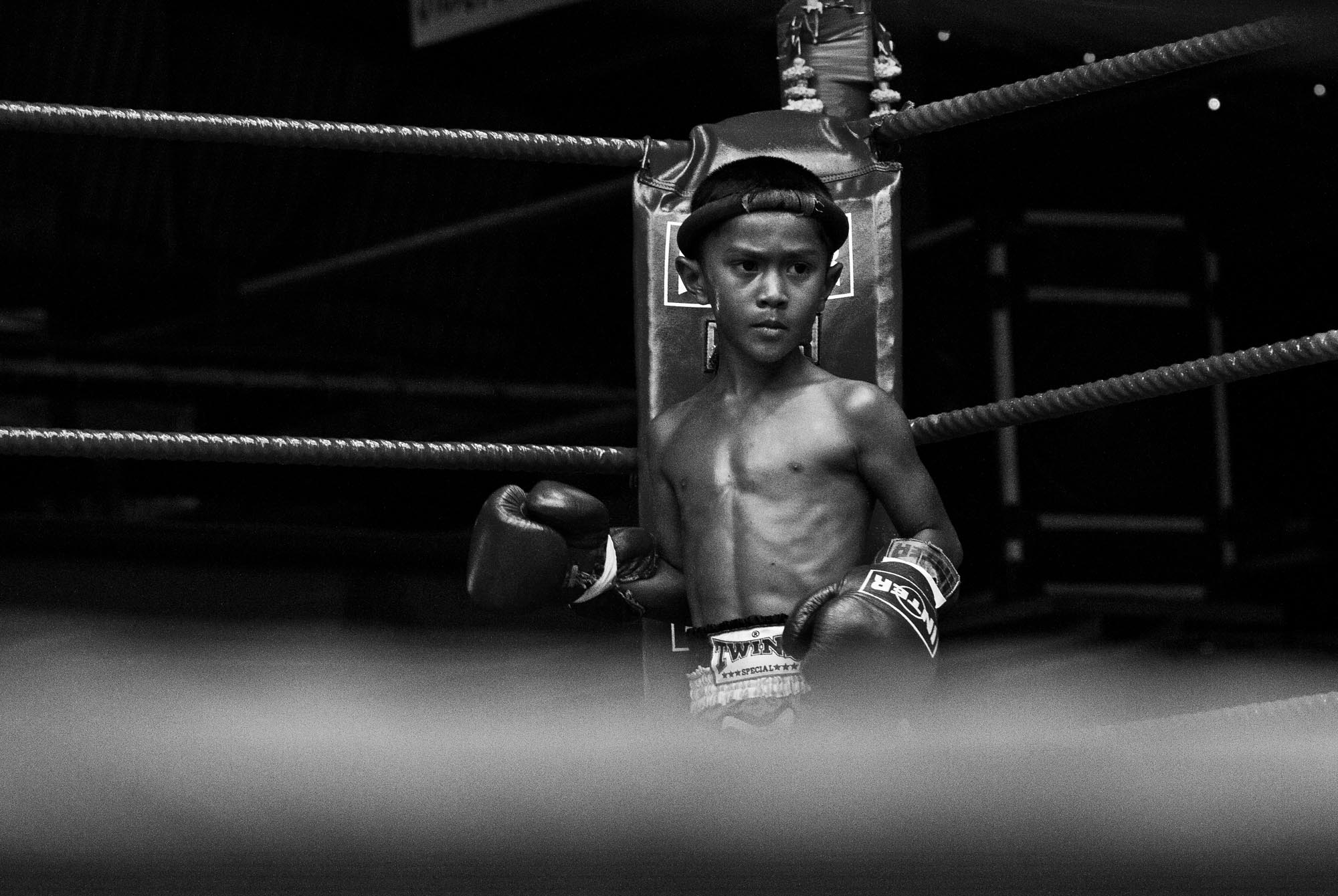A child muay thai fighter during a fight in Phuket Thailand